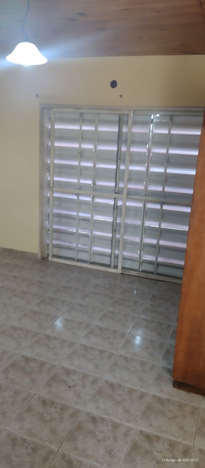 Casa planta alta con parrillero